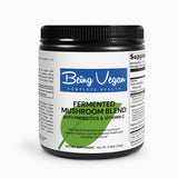 Black bottle of Being Vegan Fermented Mushroom Blend in powdered form featuring six organic mushrooms for immune and gut health support, designed for easy digestion and absorption.